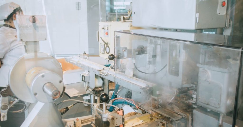 Close-up of advanced machinery in a modern laboratory setting, highlighting technology and industry.