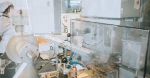 Close-up of advanced machinery in a modern laboratory setting, highlighting technology and industry.