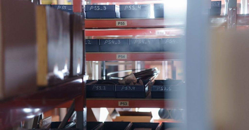 A well-organized warehouse shelving unit with numbered bins for efficient storage and inventory management.